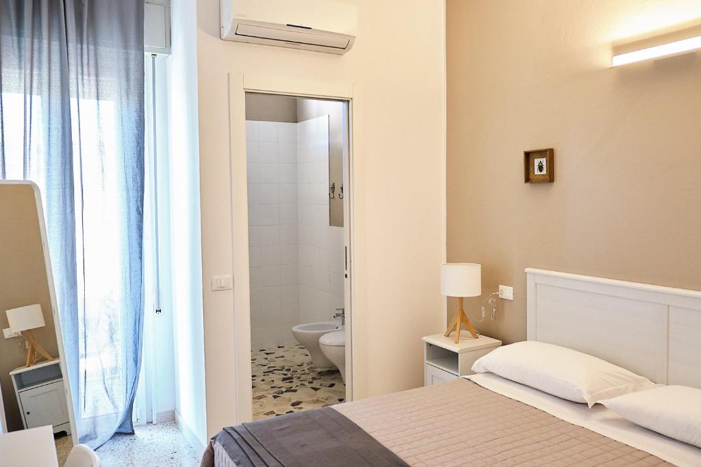 Postel nebo postele na pokoji v ubytování Hotel Spring