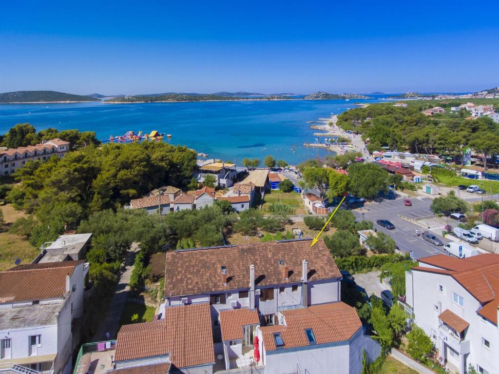 an aerial view of a small town with a body of water at Apartment Grgo in Vodice