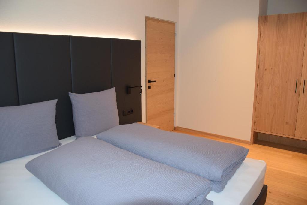 Postel nebo postele na pokoji v ubytování Premium Apartments Faselehof