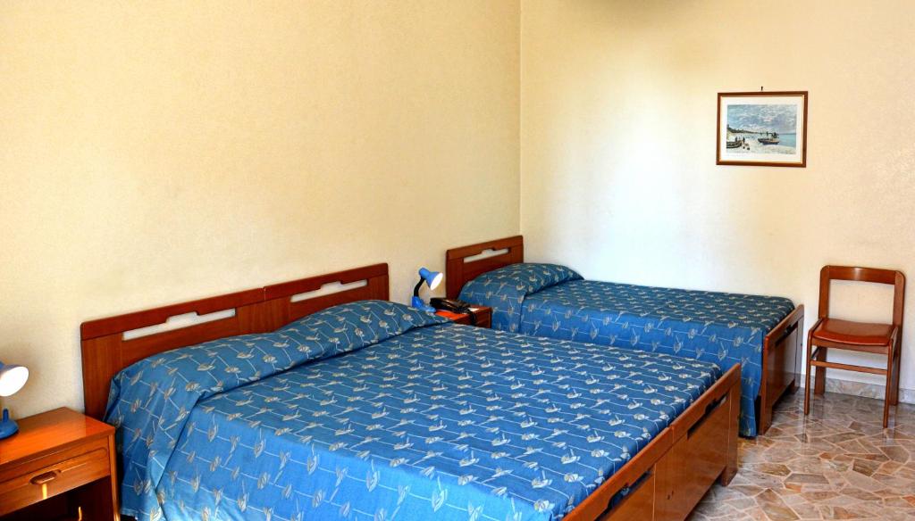 Postel nebo postele na pokoji v ubytování Hotel A-14
