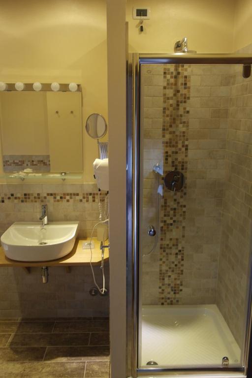 Koupelna v ubytování Piccolo Hotel Aurora