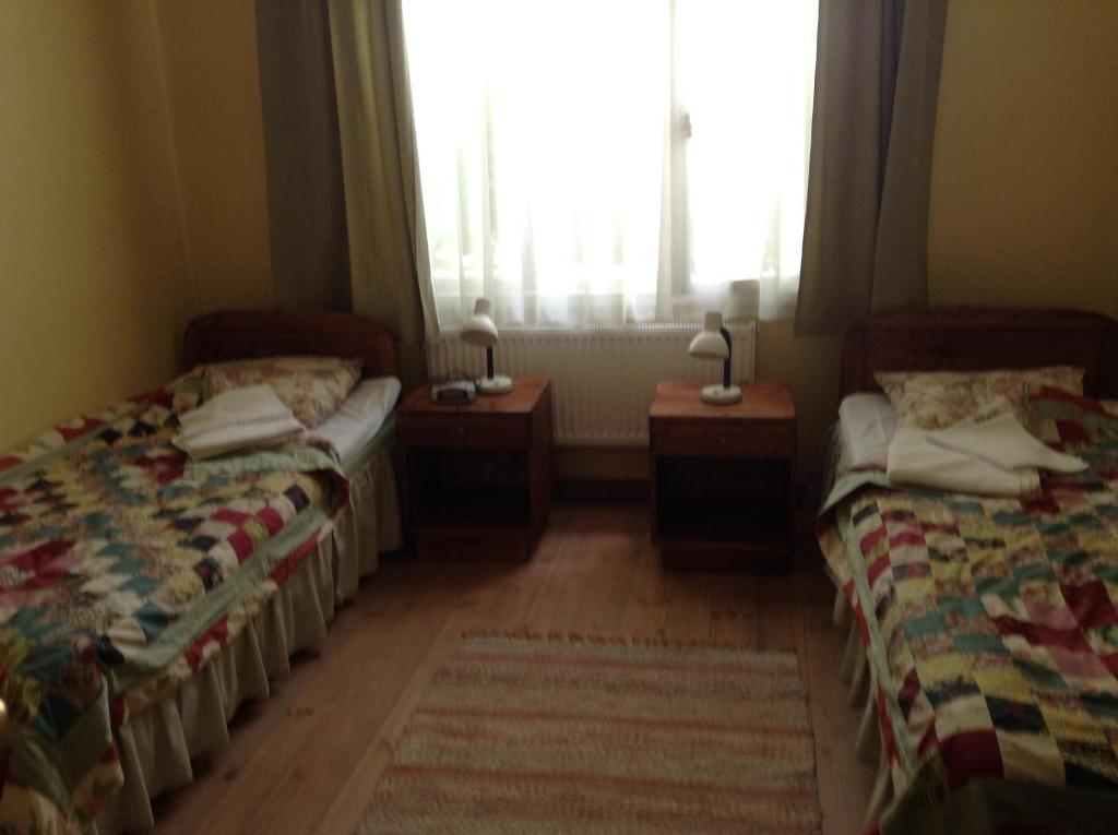 Postel nebo postele na pokoji v ubytování Kastani Home Accommodation