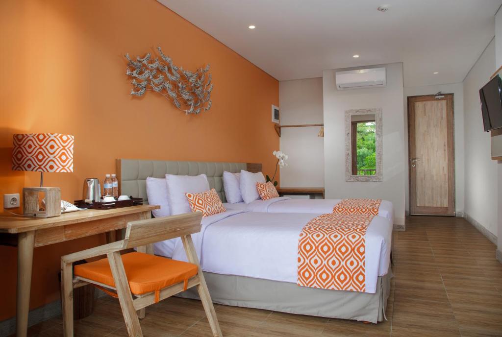 Postel nebo postele na pokoji v ubytování Mahagiri Resort Nusa Lembongan