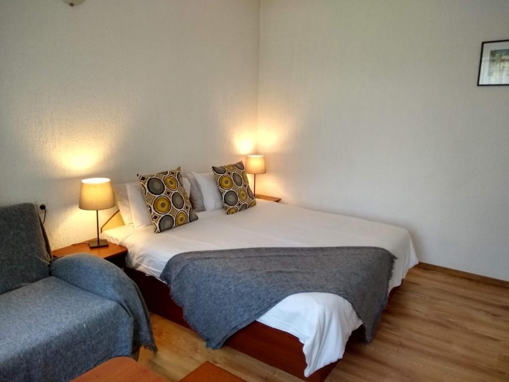 Postel nebo postele na pokoji v ubytování Michel Hotel