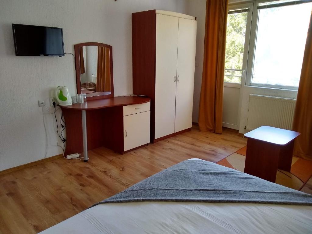 TV a/nebo společenská místnost v ubytování Michel Hotel