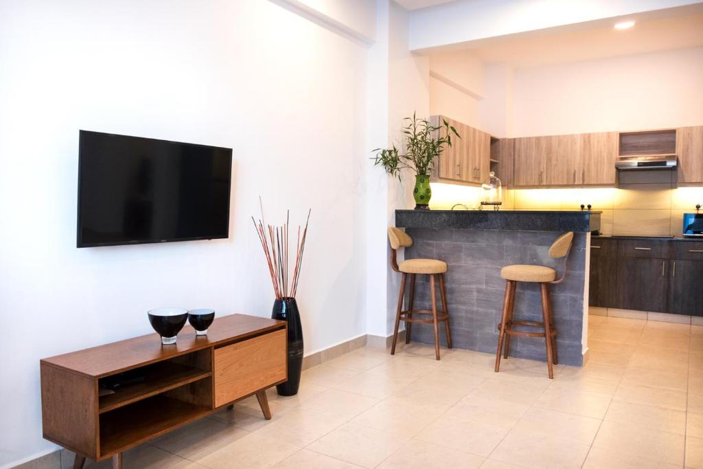 Kuchyň nebo kuchyňský kout v ubytování L'Aziz Suites