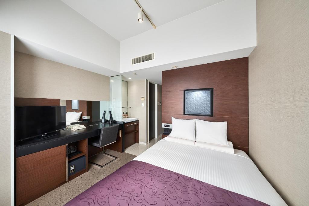 TV a/nebo společenská místnost v ubytování HOTEL MYSTAYS Shimizu