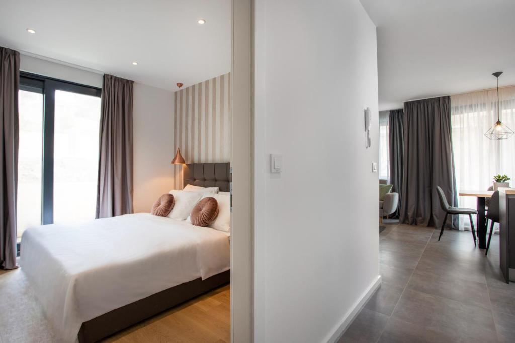 Postel nebo postele na pokoji v ubytování Apartments Jadranka