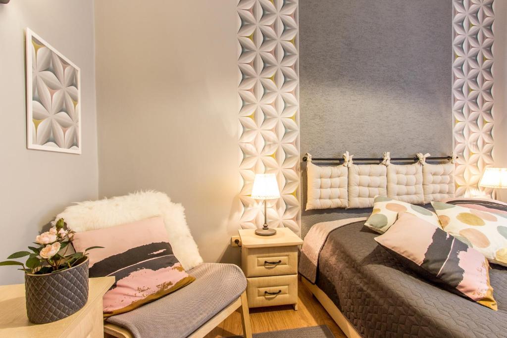 Posteľ alebo postele v izbe v ubytovaní Apartament Bulwary Zakopane