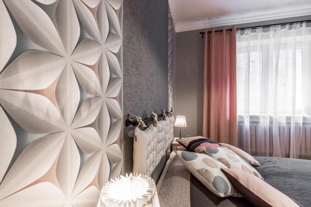 Posteľ alebo postele v izbe v ubytovaní Apartament Bulwary Zakopane