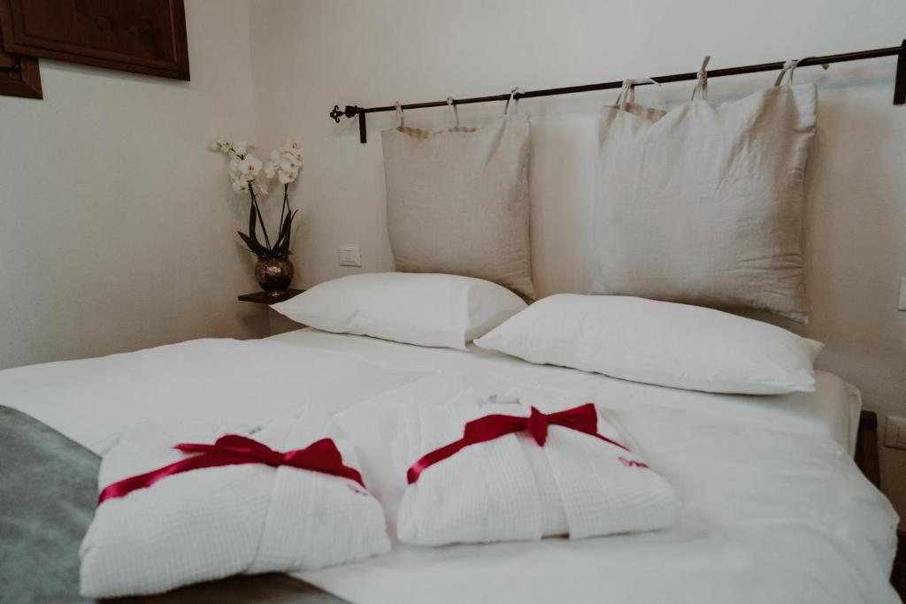 Postel nebo postele na pokoji v ubytování SommaVilla B&B