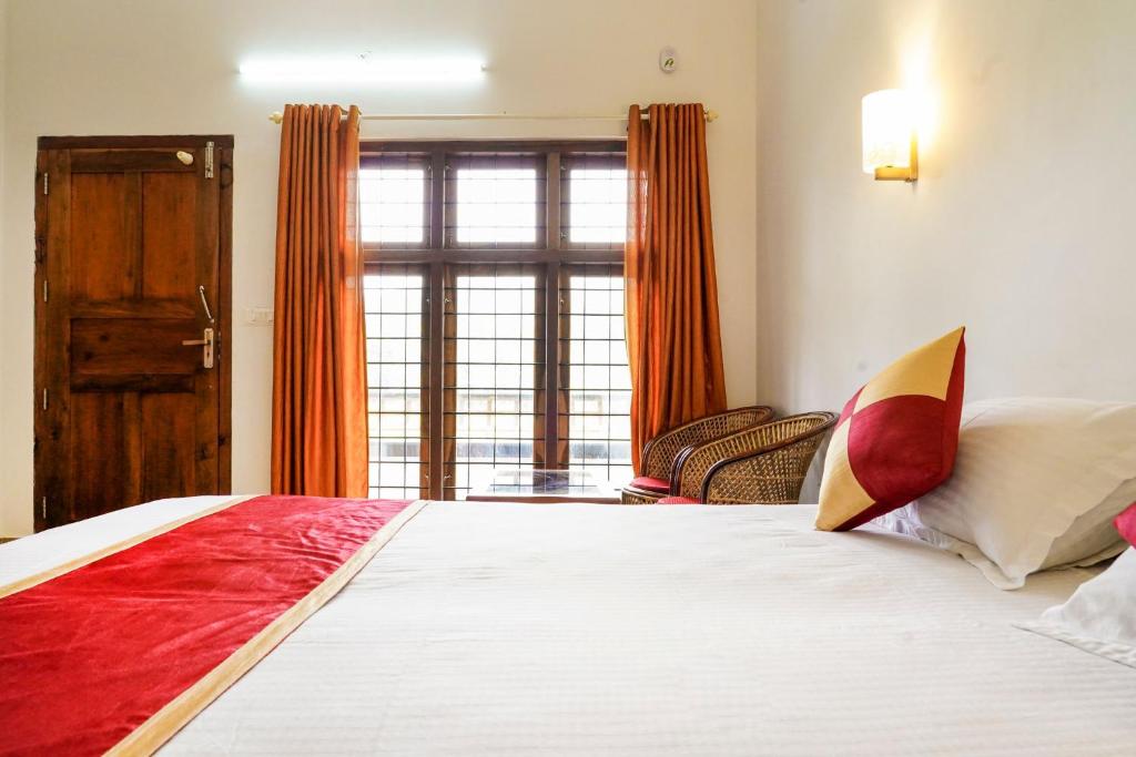 Postel nebo postele na pokoji v ubytování Wild Mist Homestay