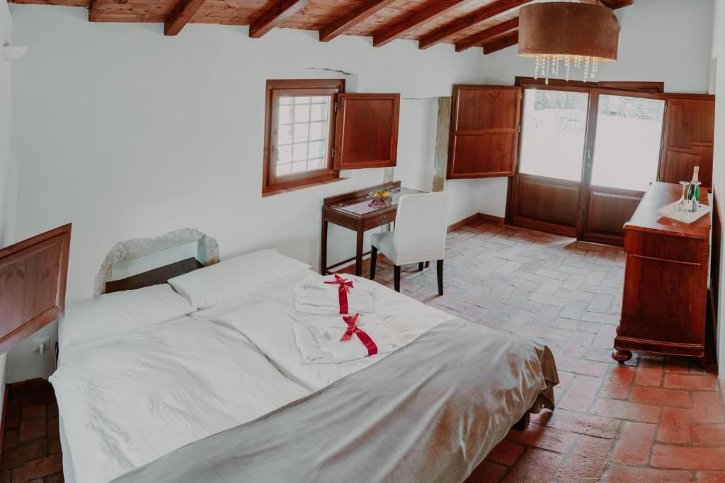 Postel nebo postele na pokoji v ubytování SommaVilla B&B