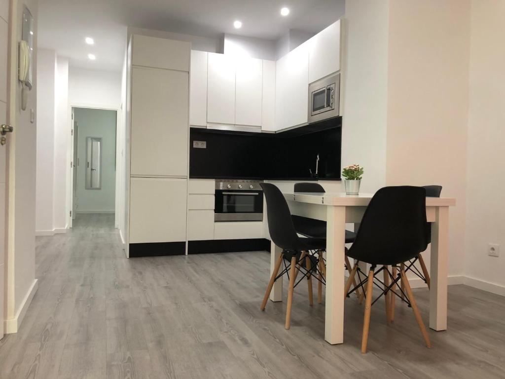 Kuchyň nebo kuchyňský kout v ubytování APARTAMENTOS CAZORLA CENTRO