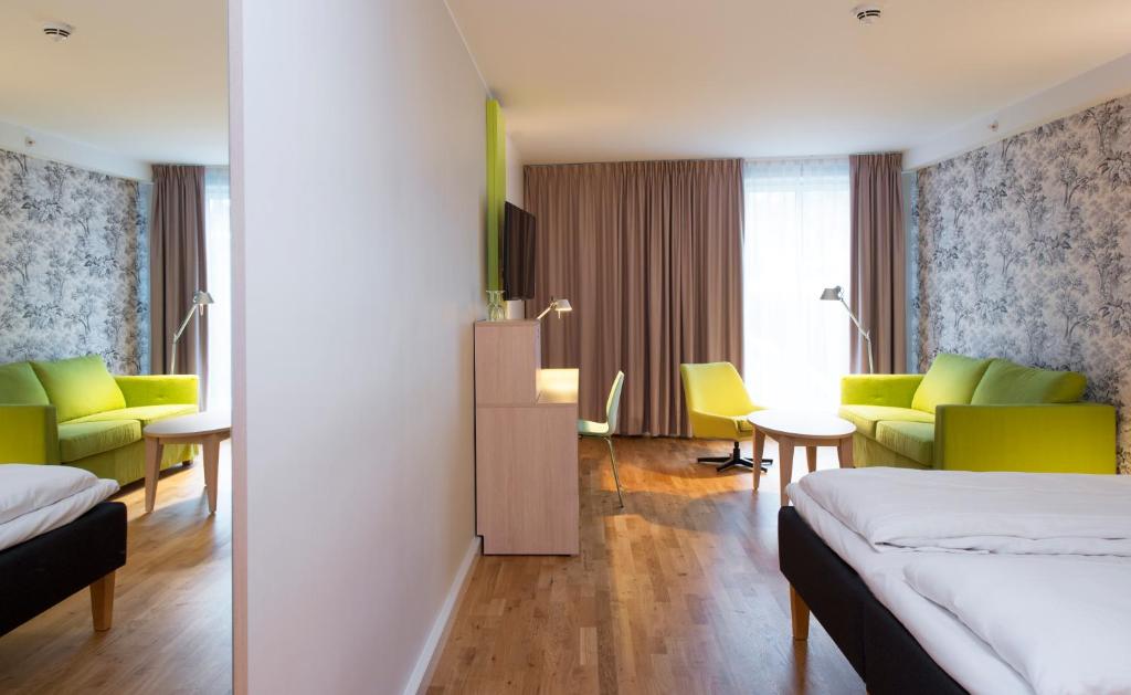 Postel nebo postele na pokoji v ubytování Thon Hotel Sandven