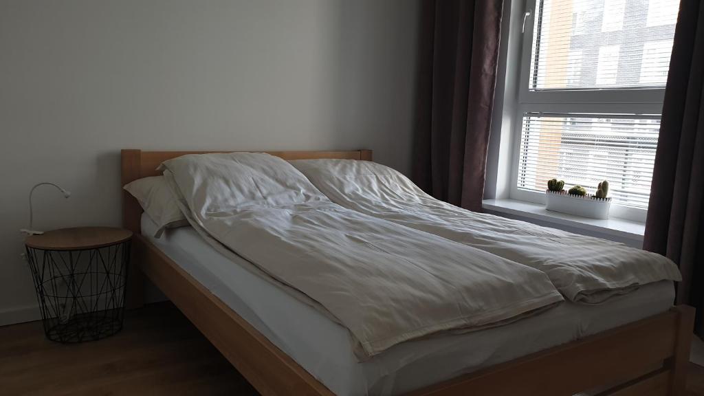 Posteľ alebo postele v izbe v ubytovaní Quo Vadis Apartment