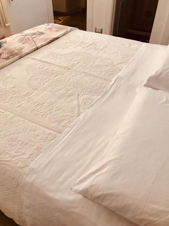Posteľ alebo postele v izbe v ubytovaní Arianiello Suite a due passi dal Cristo Velato