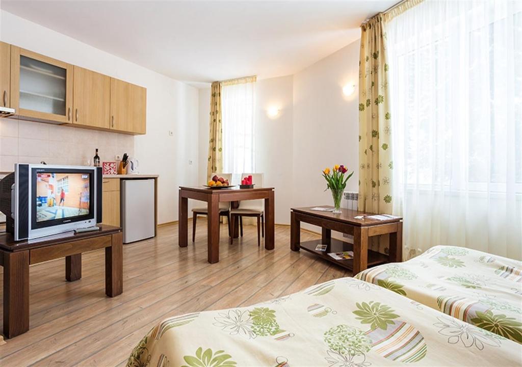 TV a/nebo společenská místnost v ubytování The Stream Resort