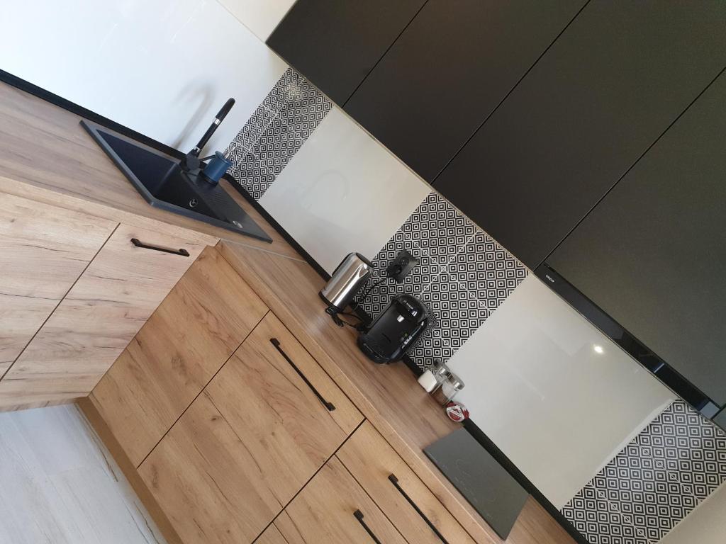 Kuchyňa alebo kuchynka v ubytovaní VISTULA two-bedroom Apartment