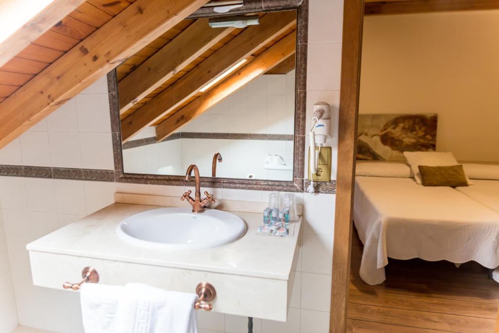 Postel nebo postele na pokoji v ubytování Hotel Ambasmestas