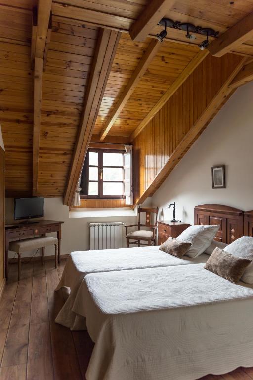 Postel nebo postele na pokoji v ubytování Hotel Ambasmestas