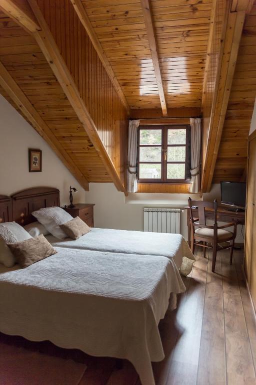 Postel nebo postele na pokoji v ubytování Hotel Ambasmestas