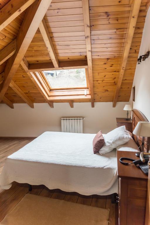 Postel nebo postele na pokoji v ubytování Hotel Ambasmestas