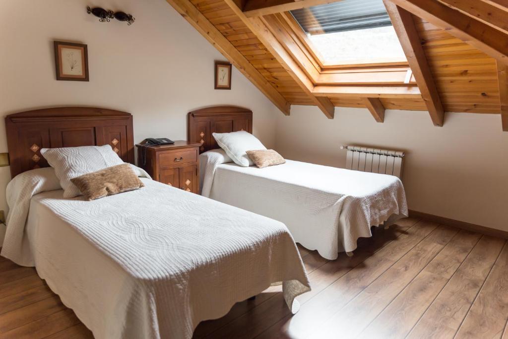Postel nebo postele na pokoji v ubytování Hotel Ambasmestas