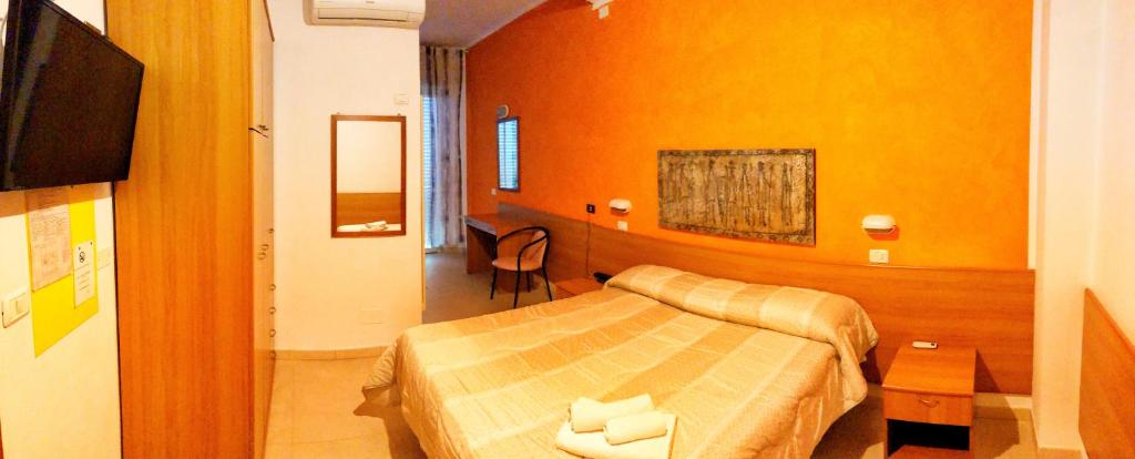 TV a/nebo společenská místnost v ubytování Hotel Amoha