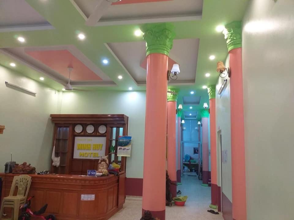 a room with columns in the middle of a room at Minh Huy Hotel in Quang Ninh