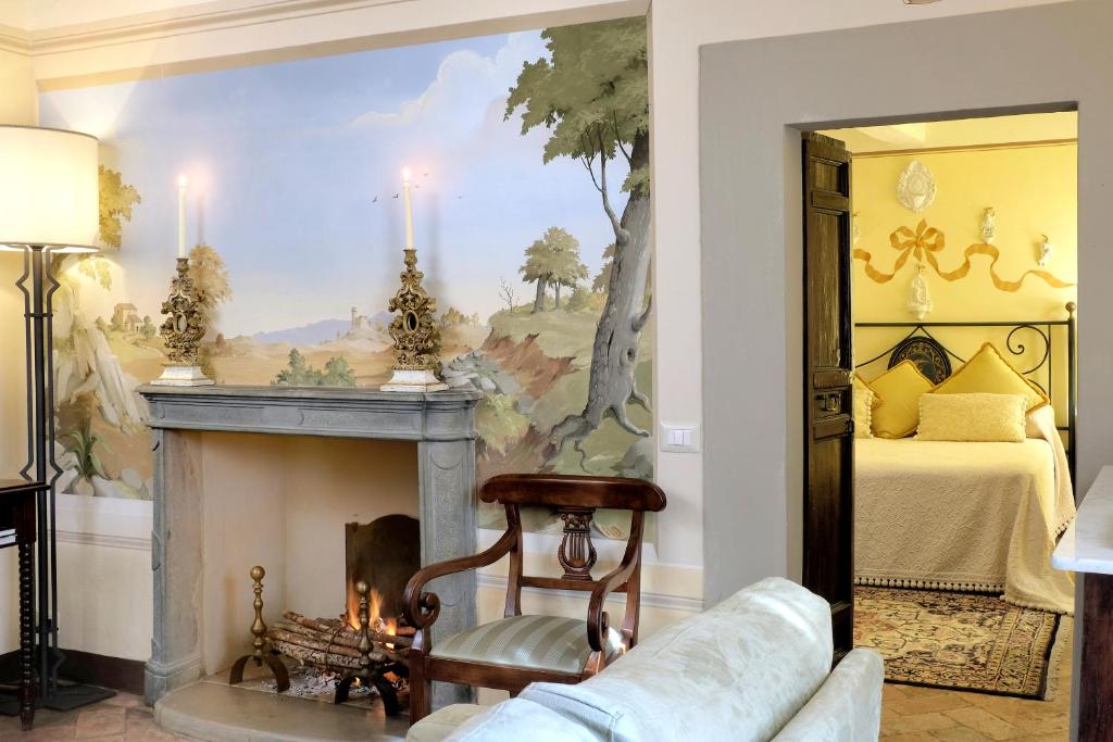 Łóżko lub łóżka w pokoju w obiekcie Il Falconiere Relais & Spa