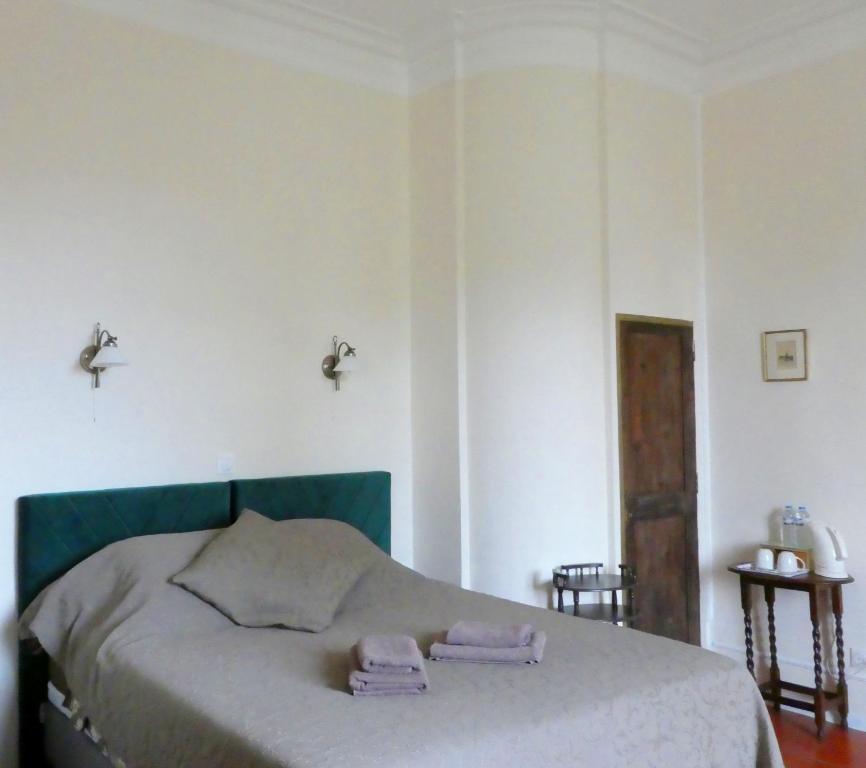 Postel nebo postele na pokoji v ubytování Chambre d'hôtes Eloi Merle
