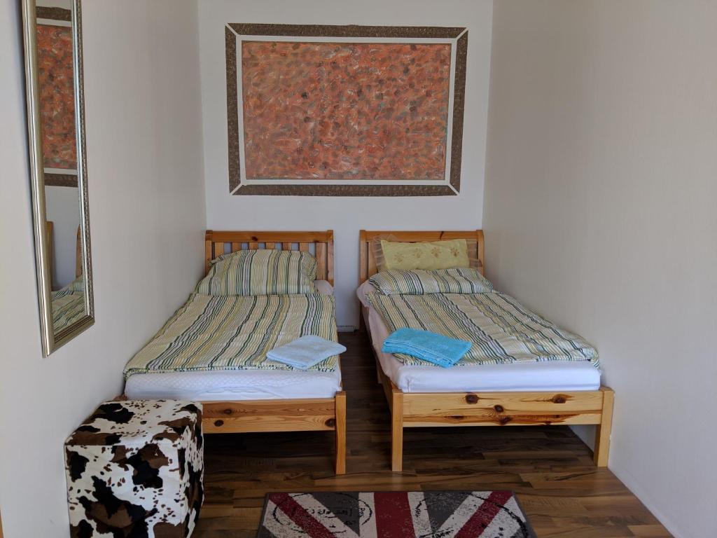 Postel nebo postele na pokoji v ubytování Abdalla Apartments