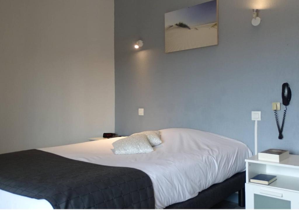 Postel nebo postele na pokoji v ubytování Europa Hotel