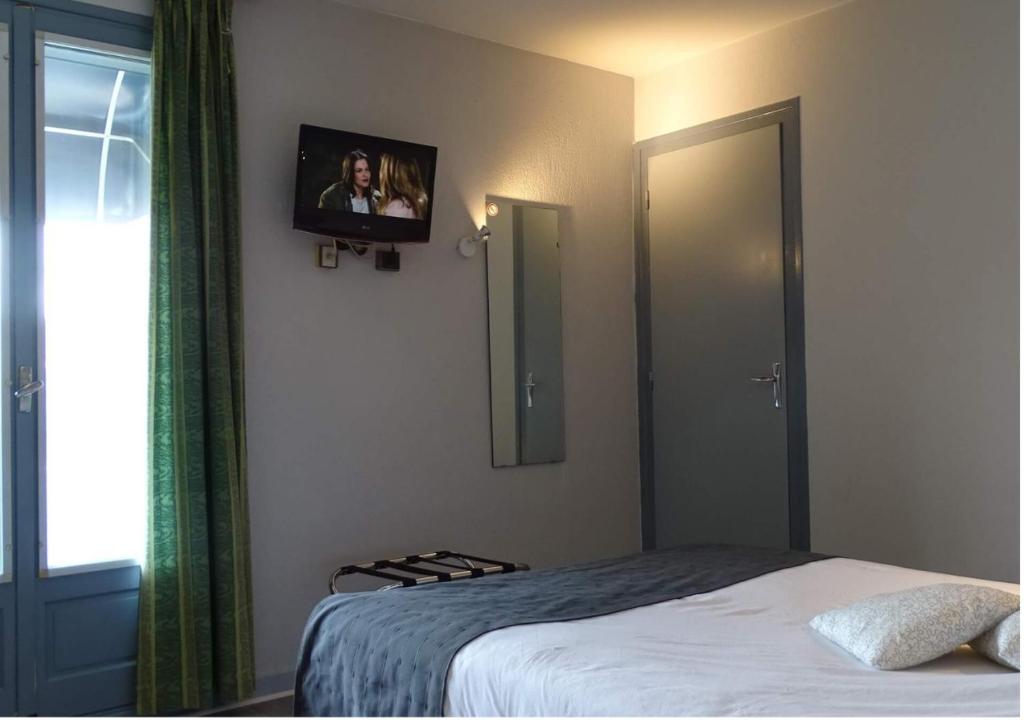 Postel nebo postele na pokoji v ubytování Europa Hotel