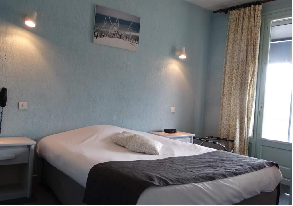 Postel nebo postele na pokoji v ubytování Europa Hotel