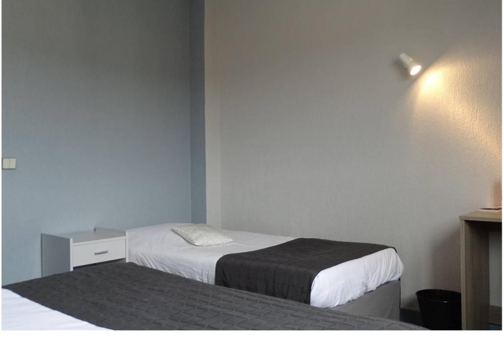 Postel nebo postele na pokoji v ubytování Europa Hotel