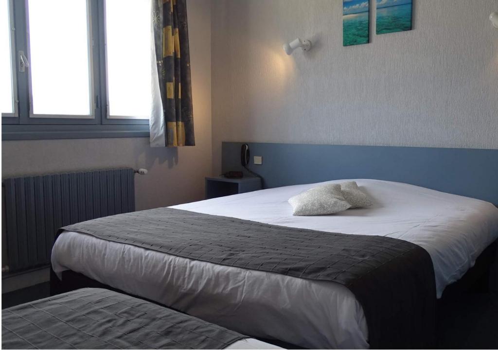 Postel nebo postele na pokoji v ubytování Europa Hotel