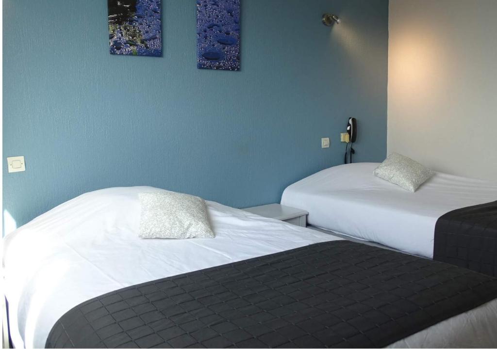 Postel nebo postele na pokoji v ubytování Europa Hotel
