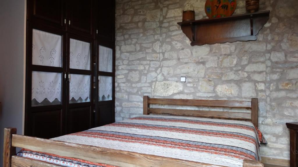 Postel nebo postele na pokoji v ubytování Filia House - Kalavryta