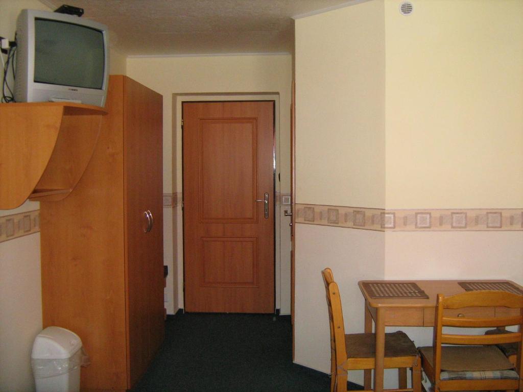 TV a/nebo společenská místnost v ubytování Penzion Albína - Restaurace