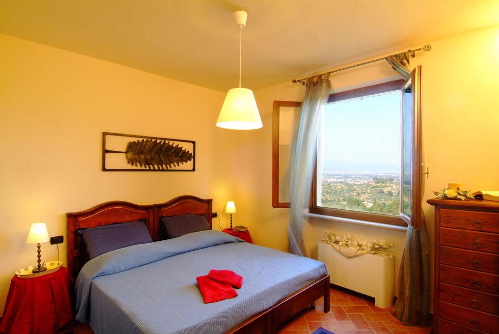 Posteľ alebo postele v izbe v ubytovaní Poggio Desto Bed & Breakfast