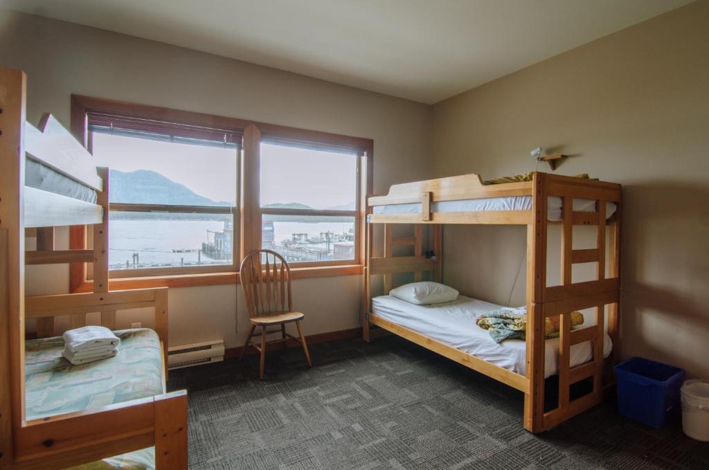 Postel nebo postele na pokoji v ubytování Whalers Guesthouse