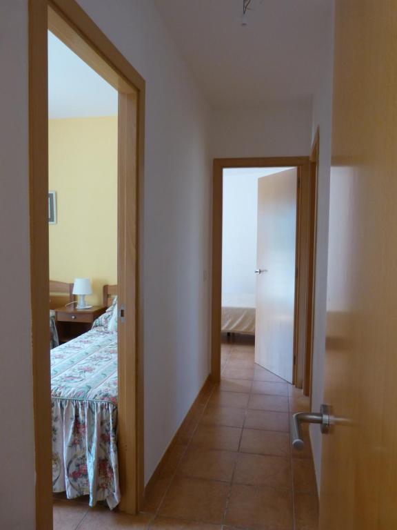 Posteľ alebo postele v izbe v ubytovaní Apartamento Pescadors