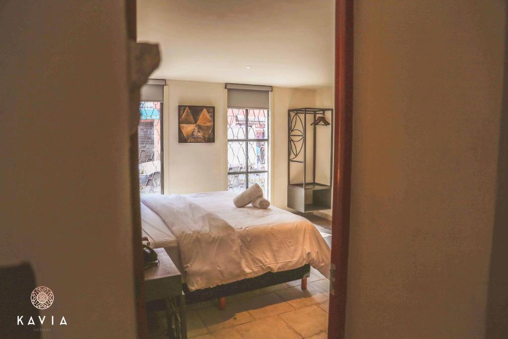 Postel nebo postele na pokoji v ubytování Hotel Urban