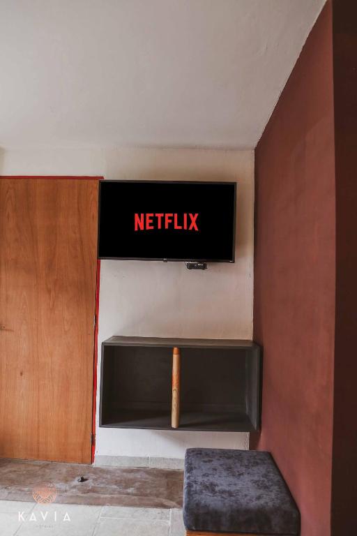 TV a/nebo společenská místnost v ubytování Hotel Urban