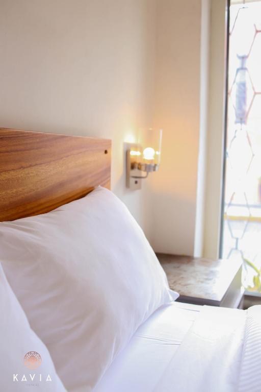 Postel nebo postele na pokoji v ubytování Hotel Urban