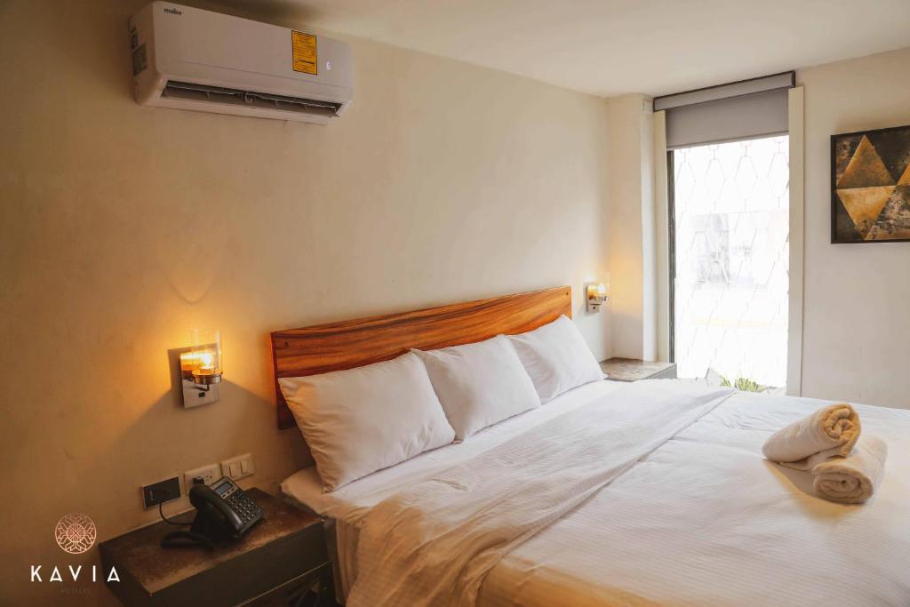 Postel nebo postele na pokoji v ubytování Hotel Urban
