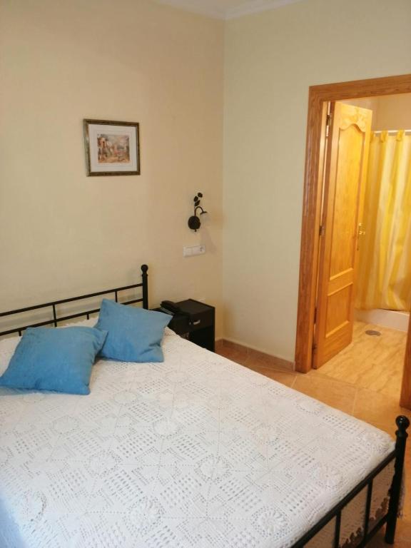 Postel nebo postele na pokoji v ubytování Hotel Paloma