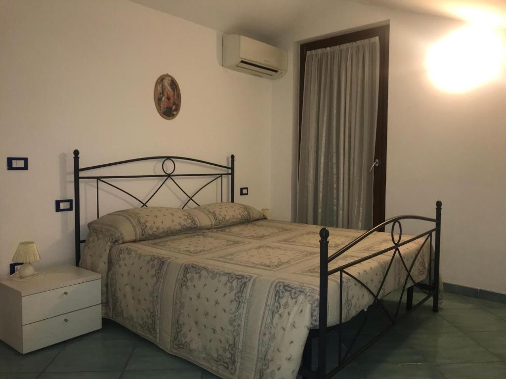 Postel nebo postele na pokoji v ubytování Appartamento Christin